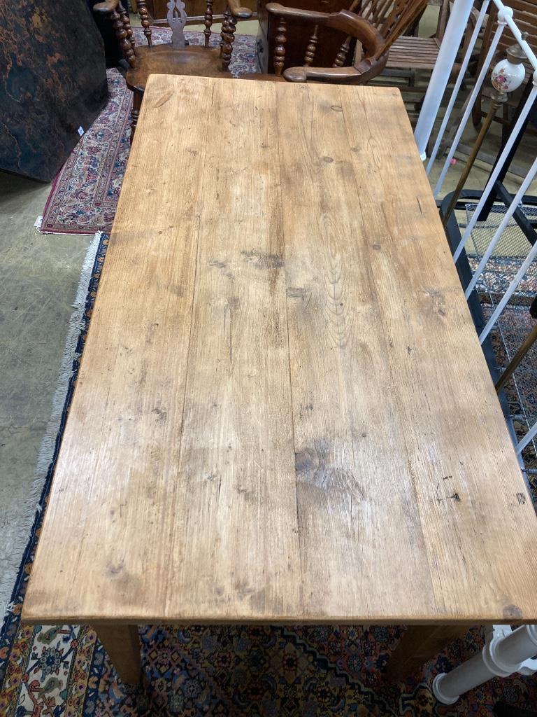 A rectangular pine kitchen table, width 160cm, depth 79cm, height 75cm